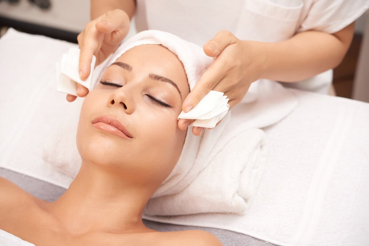 attractive woman getting face beauty procedures spa salon 1