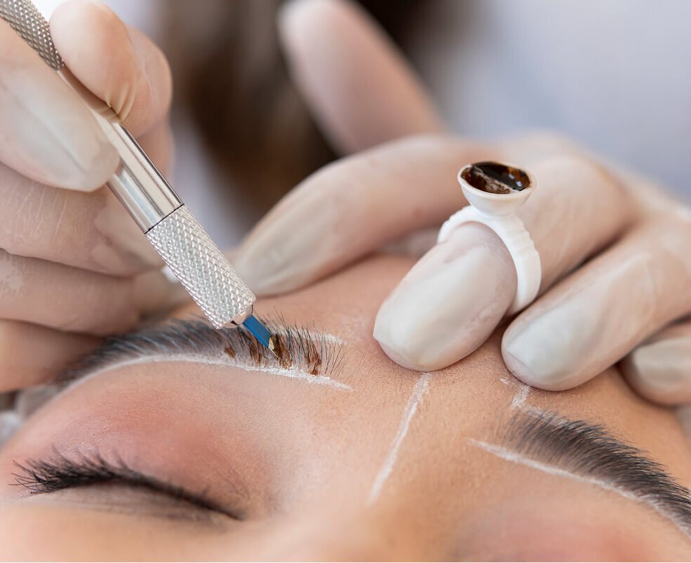 beautician doing microblading procedure client s eyebrows 1