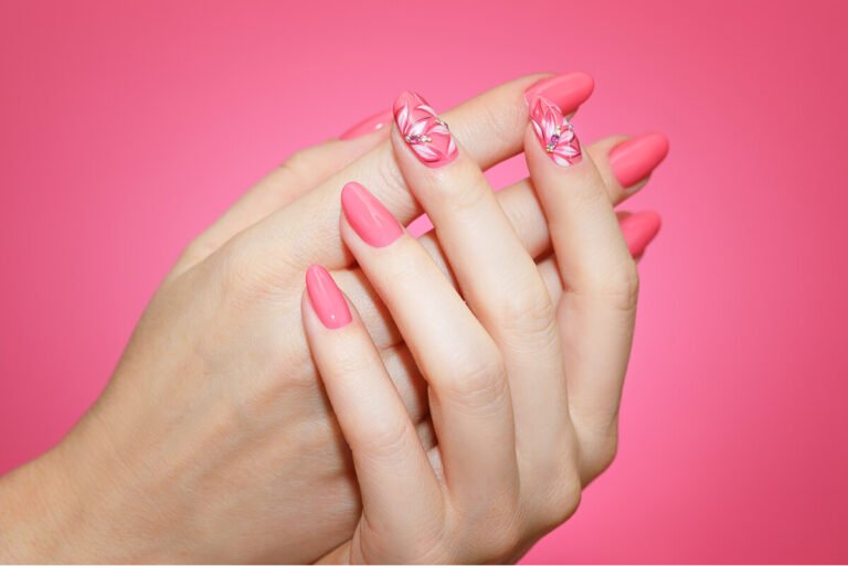 close up manicured woman s nails with pink nail art 1 (1)